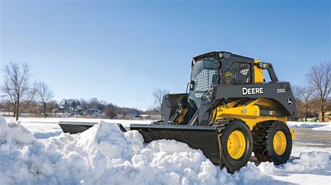 skid-steer loader snow removal|skid steer plowing snow.